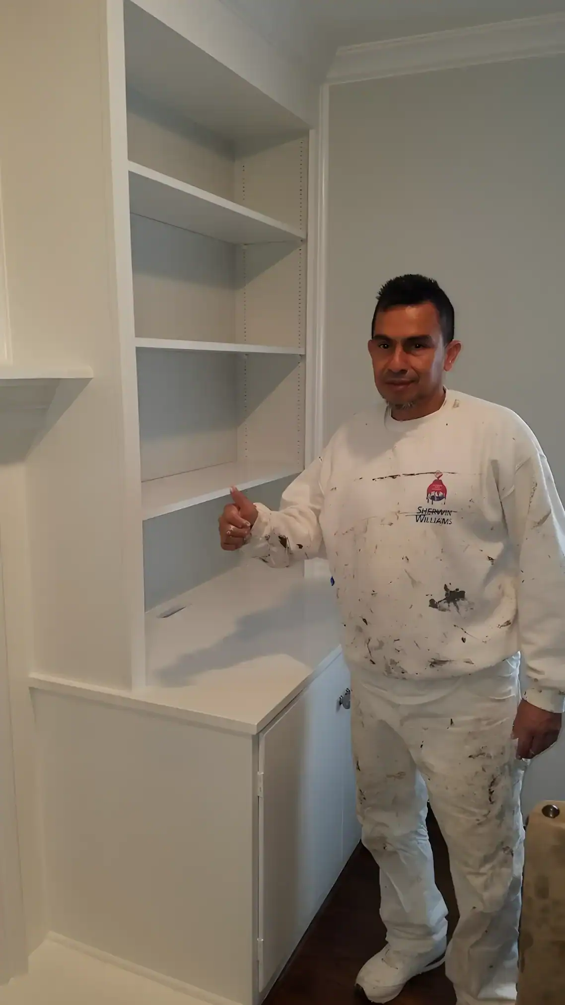 White Painted Built-in Cabinet Shelving White-painted built-in cabinet with open shelving and lower storage, interior residential painting project