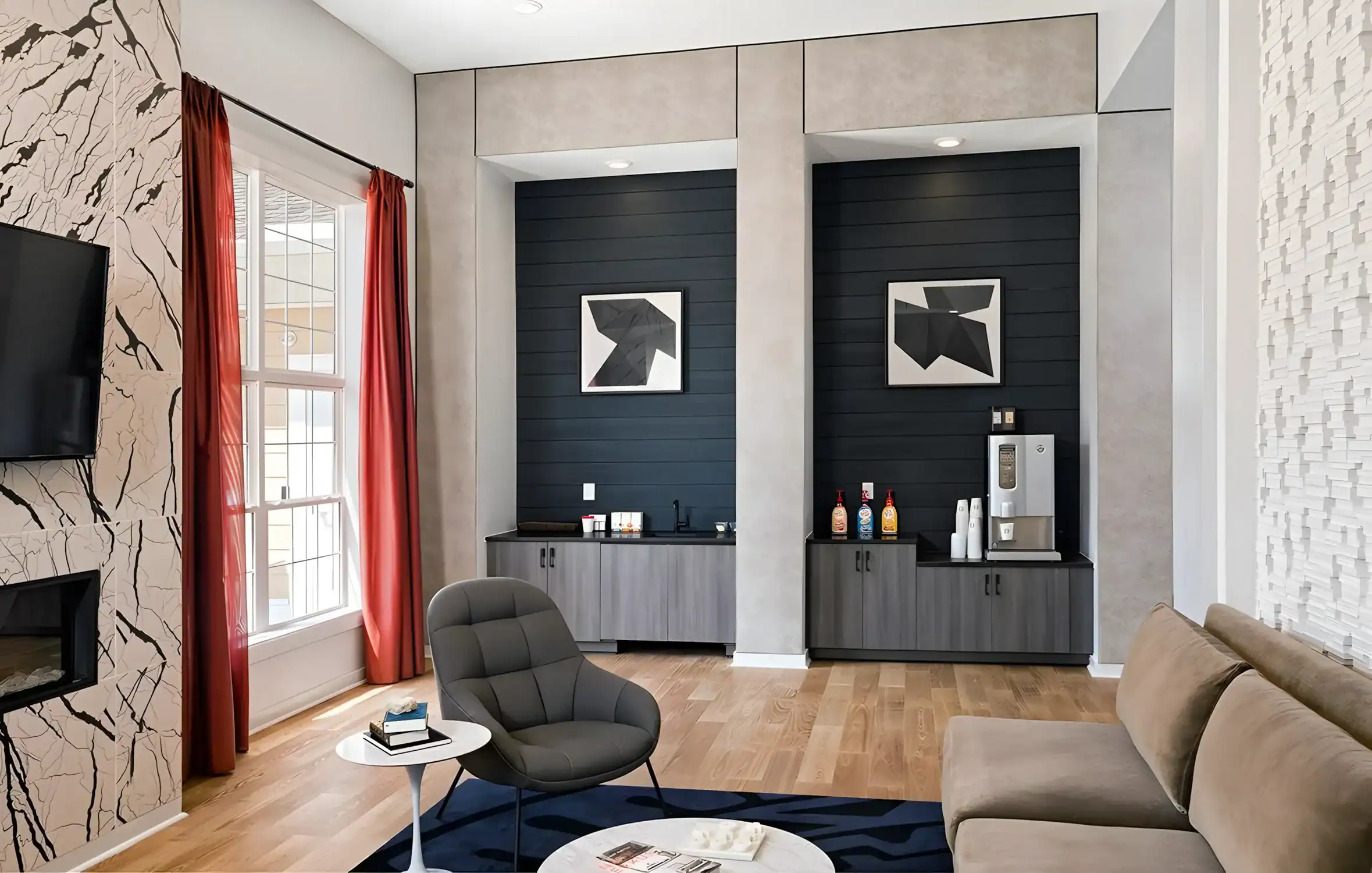 Coffee Station Interior Paint Modern residential interior with dark navy-painted accent wall featuring built-in shelving and white artwork display